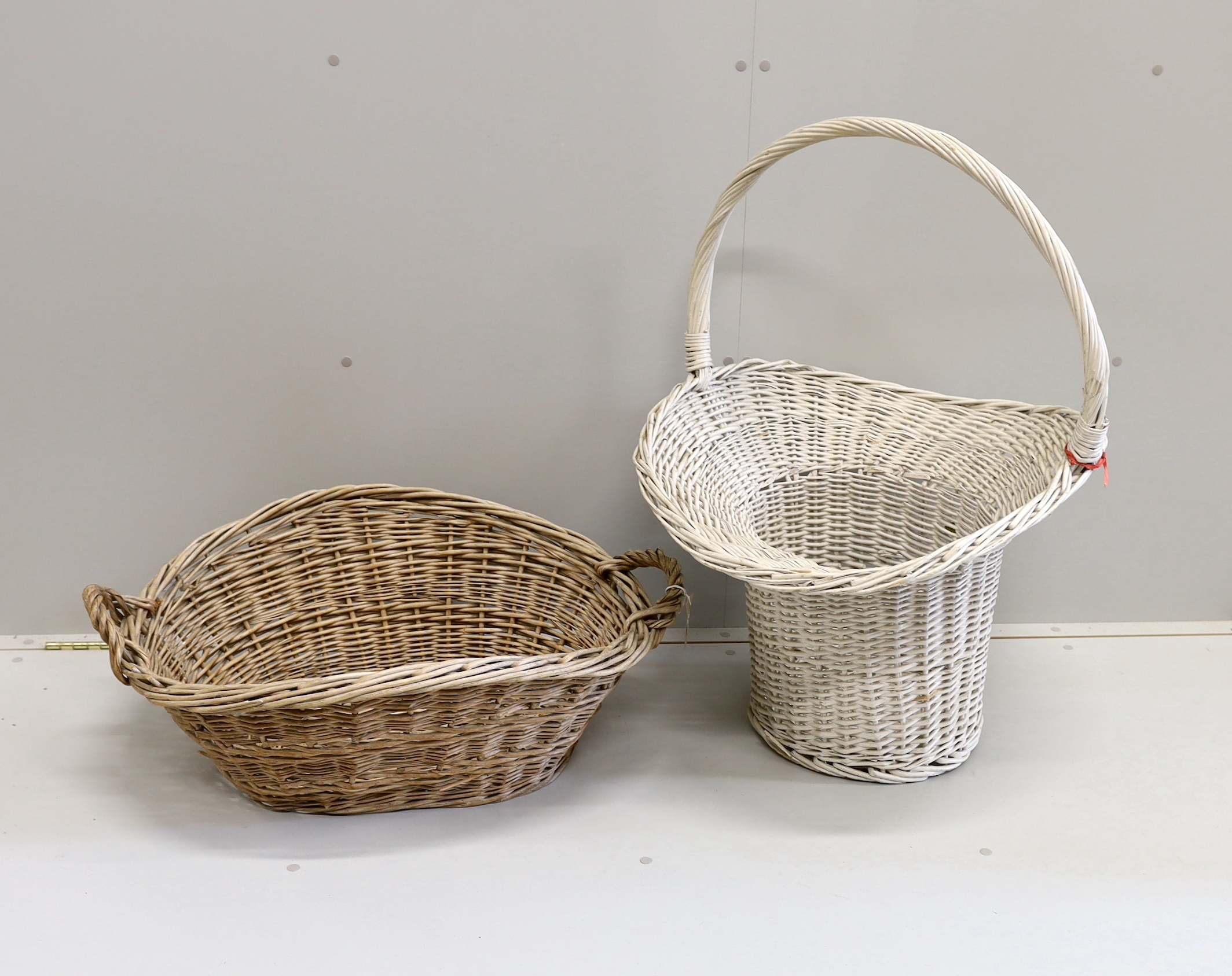 Two large wicker baskets, larger height 86cm